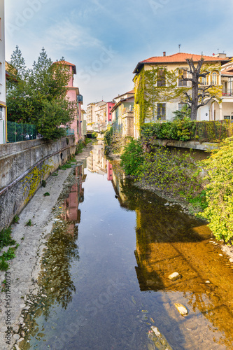 The small river that runs through the city of Bergamo Italy photo
