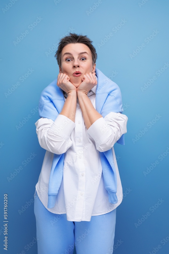 close-up portrait of a charismatic short-haired lady in a casual shirt close-up portrait of a charismatic short-haired lady in a casual shirt