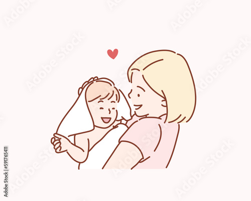 Happy family mother and baby in a white towel after bathing in the bath. Hand drawn style vector design illustrations.