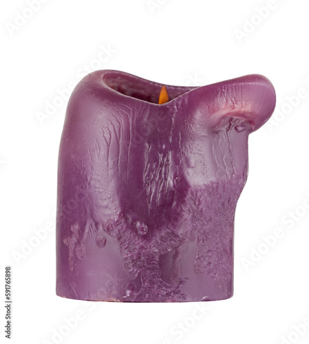 Purple candle with partially melted wax and lit wick. Wrinkled, rough surface of the candle. Transparent background.