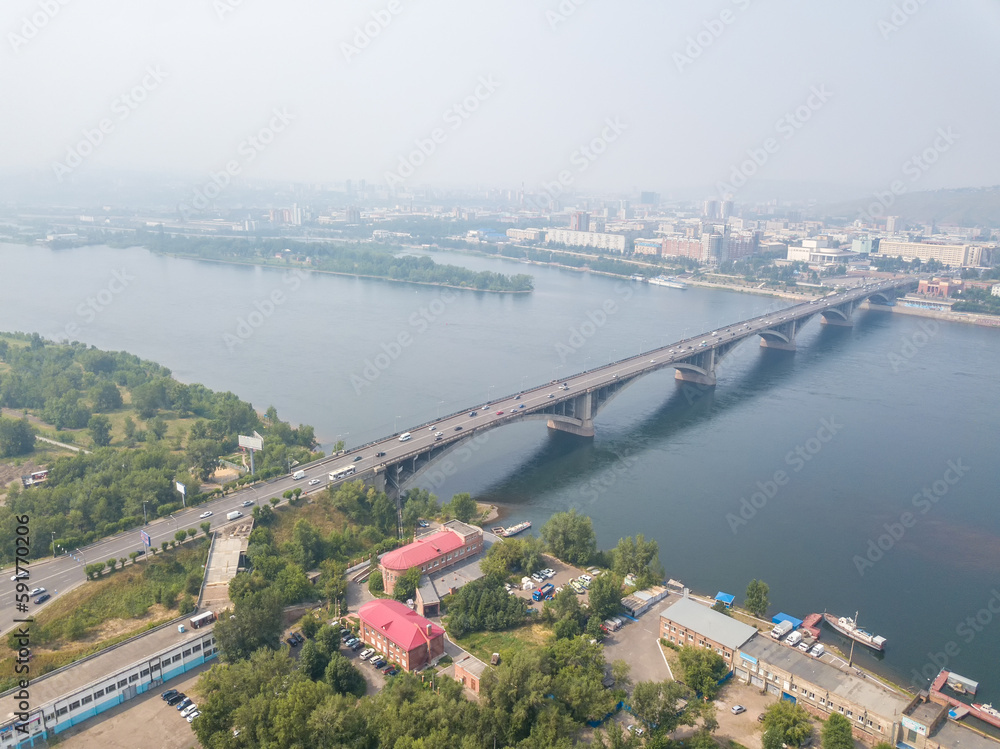 Russia, Krasnoyarsk - July 23, 2018: General Aerial View of the city center, Communal Bridge over the Yenisei River, Aerial photography
