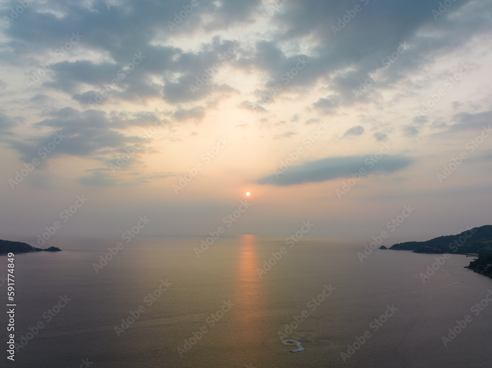 aerial panorama view beautiful sunset The beautiful sky reflects on the sea.scenery sunset at  Patong Beach, Phuket used to be one of the top tourist destinations in the world..sky sunset background