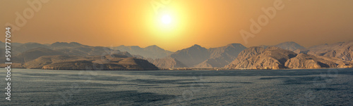 Sunset in Sinai Mountains, Oman. panorama of Sinai mountains on stunning sunset. colorful landscape. Wonderful solar Red Sea. Bible Landscape - Sinai And Red Sea