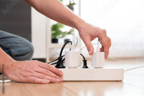 Schilderij op canvas Multiple socket with plugs, energy efficiency