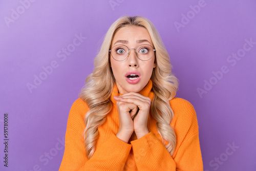 Photo of impressed pretty lady open mouth staring cant believe isolated on violet color background