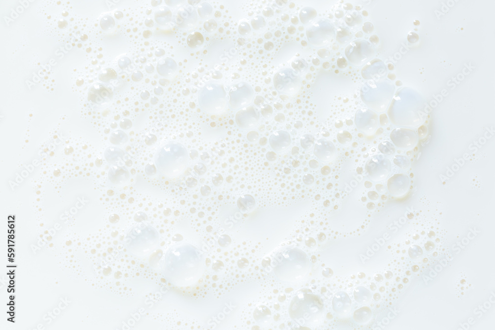 macro milk background,White surface of milk and bubbles and ripples from above birds eye view macro milk background,White surface of milk and bubbles and ripples from above birds eye view