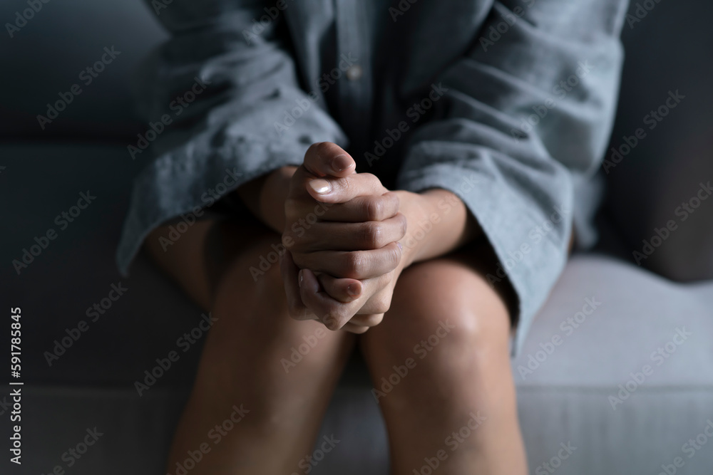 Female hands showing stress, young woman feeling sad tired and worried suffering depression in mental health