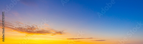 Fototapeta Naklejka Na Ścianę i Meble -  orange sky background,Sunset sky for background or sunrise sky and clouds in the morning.