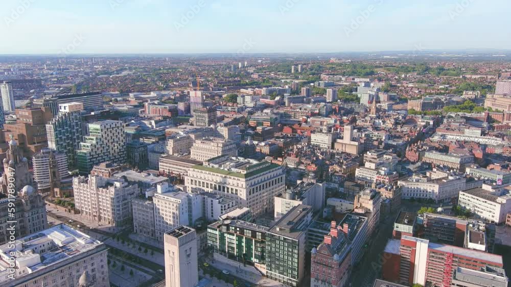 Liverpool, UK: Aerial view of famous city and seaport in England, sunny summer day - landscape panorama of United Kingdom from above
Liverpool, UK: Aerial view of famous city and seaport in England, sunny summer day - landscape panorama of United Kingdom from above