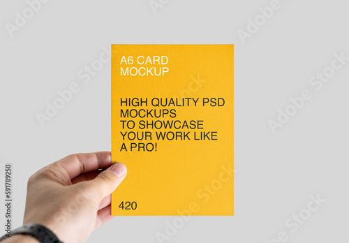 A6 Leaflet in Hand Mockup