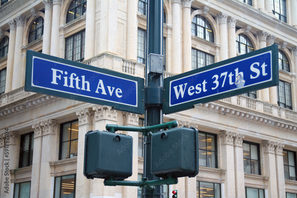 Obraz premium Blue West 37th Street and Fifth Avenue historic sign in midtown Manhattan