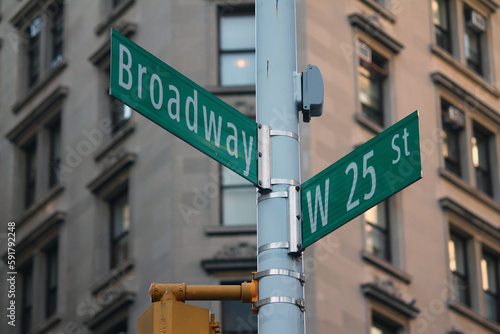 Green West 25th Street and Broadway traditional sign in Midtown Manhattan © willeye
