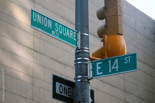 Green East 14th Street and Union Square traditional sign in Midtown Manhattan