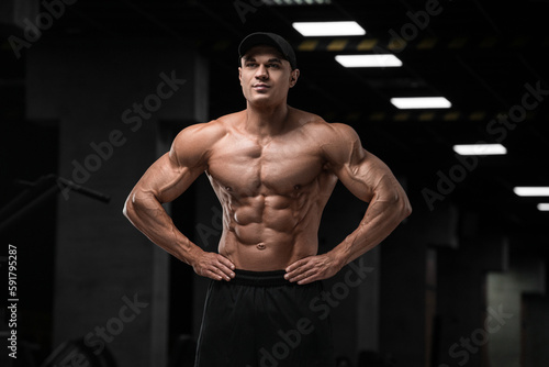 Bodybuilding. Posing. Training at the gym. © Dmitriy Kirshman