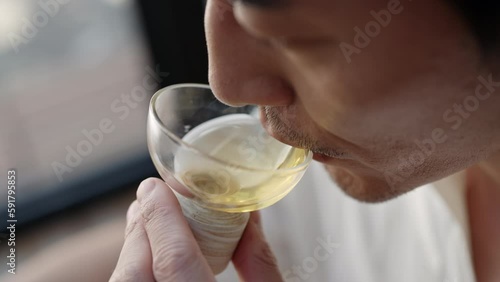 Mid adult man drinking tea in tea room,4K