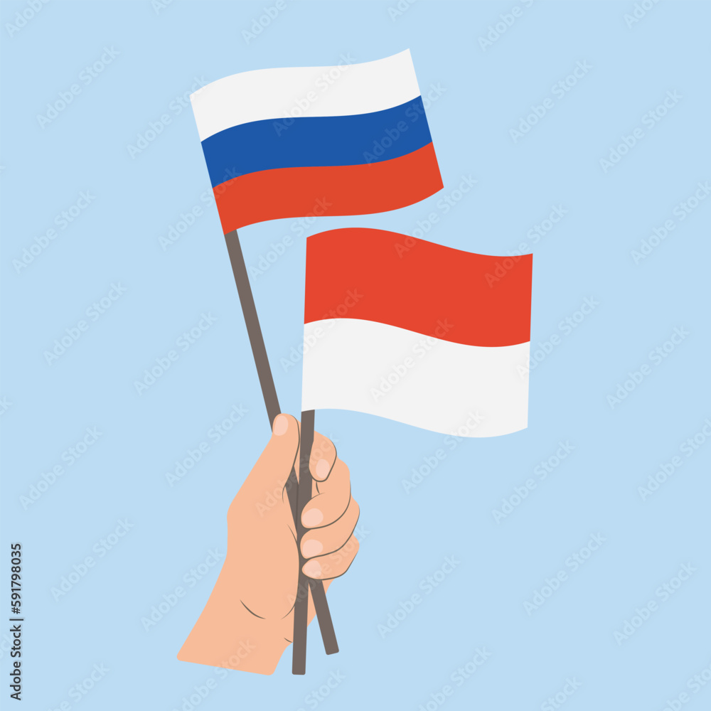 Flags of Russia and Monaco, Hand Holding flags Flags of Russia and Monaco, Hand Holding flags
