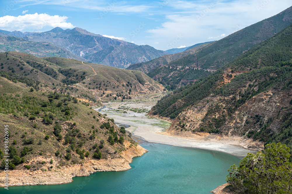 A view of the Rules Reservoir. Velez de Benaudalla, province of Granada, Andalusia, Spain. A view of the Rules Reservoir. Velez de Benaudalla, province of Granada, Andalusia, Spain.