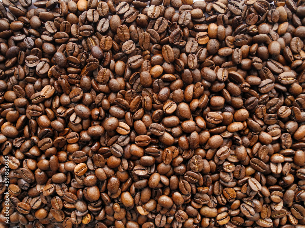 Roasted coffee beans background top view Roasted coffee beans background top view