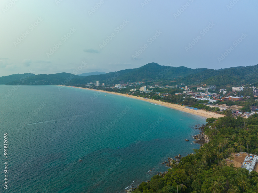 .aerial view above turquoise sea at Karon beach..smooth waves in green sea background..coral reef under the blue sea. sea texture. .color sea light rays in coral reef.