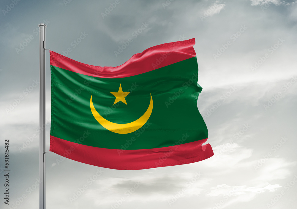 Mauritania national flag cloth fabric waving on beautiful sky Background. Mauritania national flag cloth fabric waving on beautiful sky Background.