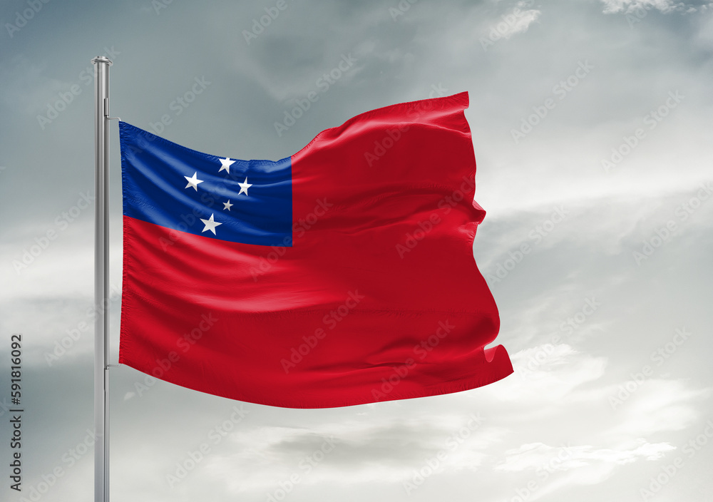 Naklejka premium Samoa national flag cloth fabric waving on beautiful sky Background.