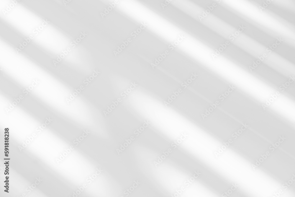 Gray shadow and light blur abstract background on white wall from window. Dark stripe grey shadows indoor in room background, monochrome, shadow overlay effect for backdrop and mockup design Gray shadow and light blur abstract background on white wall from window. Dark stripe grey shadows indoor in room background, monochrome, shadow overlay effect for backdrop and mockup design