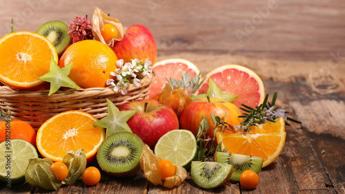 Fototapeta Naklejka Na Ścianę i Meble -  assorted of fresh fruits- orange, grapefruit, apple and kiwi