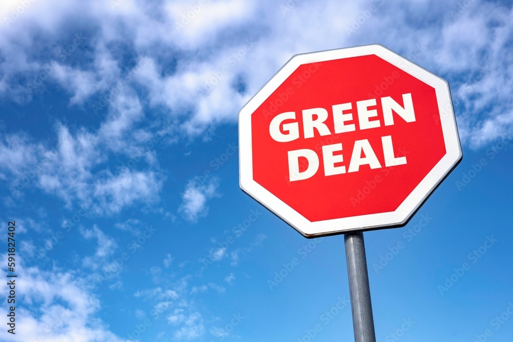 Stop sign with GREEN DEAL text to abandon controversial plan of EU to lower CO2 emissions Stop sign with GREEN DEAL text to abandon controversial plan of EU to lower CO2 emissions