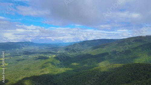 Aerial view of green dense forests in Gibraltar Range National Park in NSW, Australia
