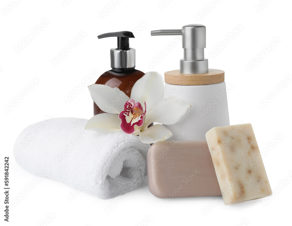 Soap bars, dispensers and terry towel on white background Soap bars, dispensers and terry towel on white background