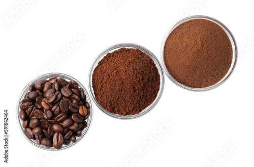 Bowls with different types of coffee on white background, top view
