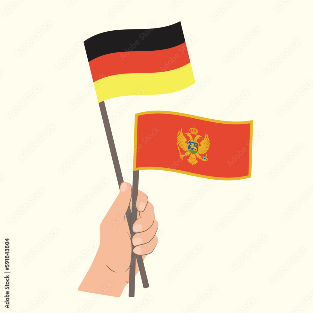 Flags of Germany and Montenegro, Hand Holding flags Flags of Germany and Montenegro, Hand Holding flags