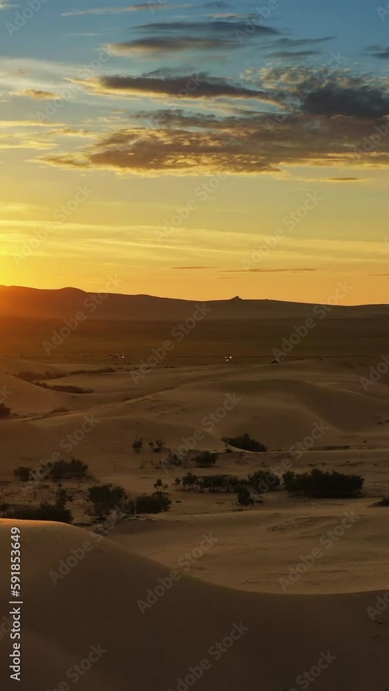 Aerial view of beatiful sunrise in desert, Mongolia. Vertical video Aerial view of beatiful sunrise in desert, Mongolia. Vertical video