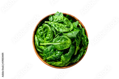 Young raw spinach in a wooden bowl.  Isolated, transparent background