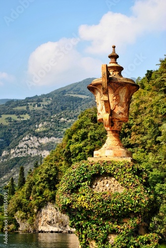Stone vase. Landing stage of the Villa del Balbianello, Lenno, Lake Como, Lombardy, Italy, Europe.