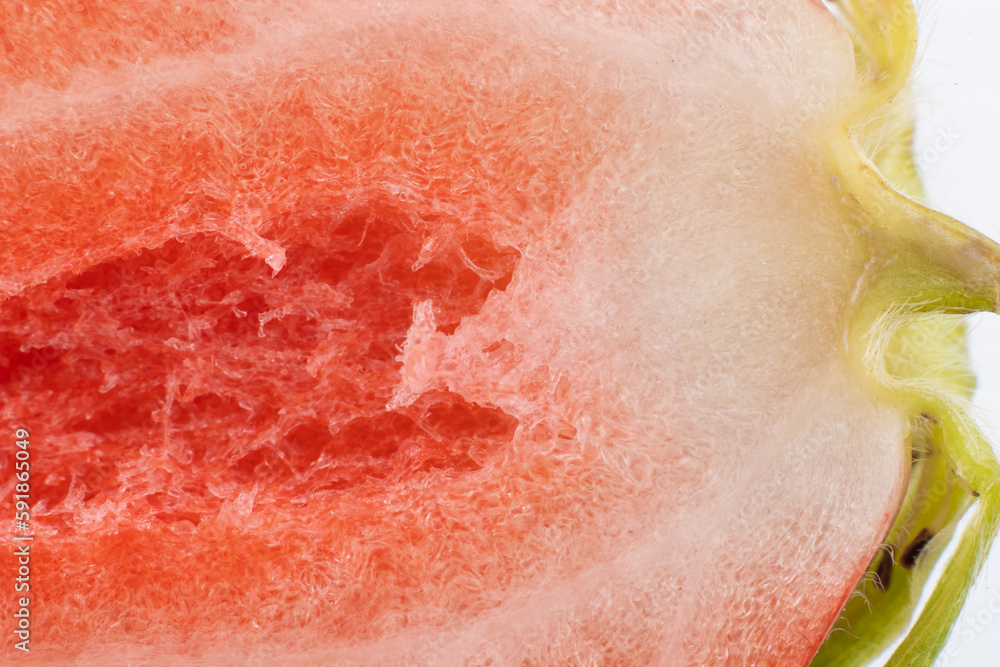 Fototapeta premium Slice macro strawberries. Fresh red strawberries, close up. red strawberry background
