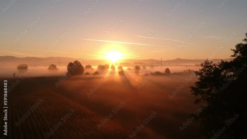 custom made wallpaper toronto digitalAerial drone footage of a landscape with fields and sunset in the background in Germany