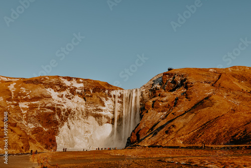 Winter raw landscapes in Iceland. The waterfall in a background
