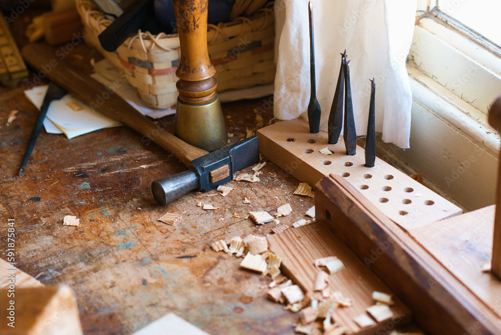 Old tools on a cabinet makers bench.