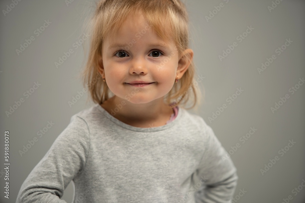 Portrait of a happy smiling child girl isolated over white background. Copy space for ad. Portrait of a happy smiling child girl isolated over white background. Copy space for ad.