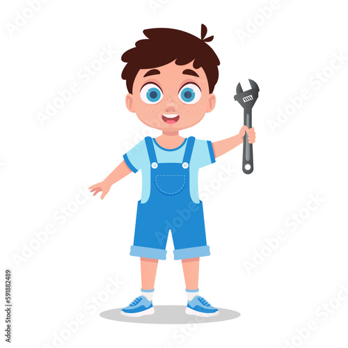 Cute boy with a wrench. Boy locksmith