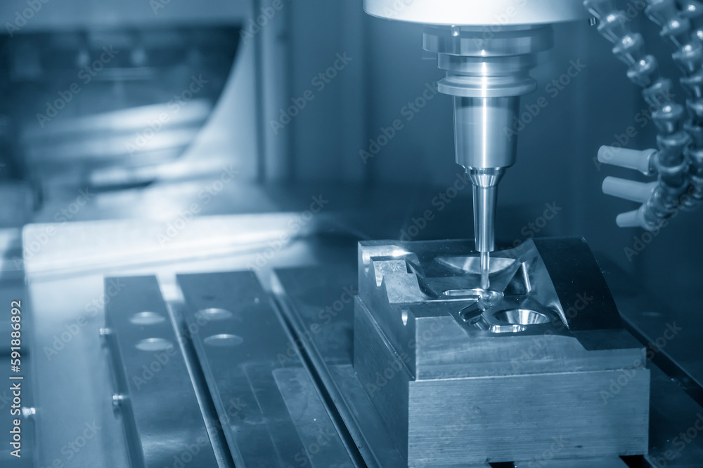 The CNC milling machine cutting injection mold part by solid ball end mill tool. The CNC milling machine cutting injection mold part by solid ball end mill tool.