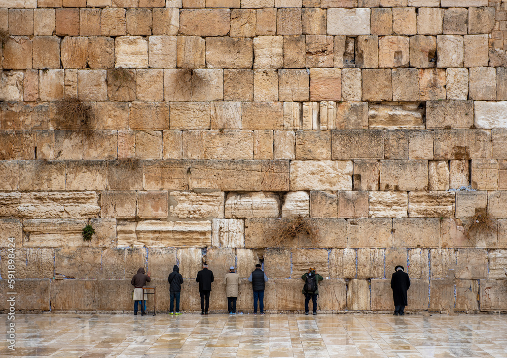 Fototapeta premium The Western Wall, Wailing Wall, or Kotel, known in Islam as the Buraq Wall, is an ancient limestone wall in the Old City of Jerusalem