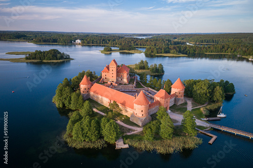 Trakai Castle with lake and forest in background. Lithuania.