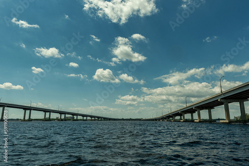 Fort Myers Landscape and Cityscape with Water and Cloudy Blue Sky. Caloosahatchee river and Bridges. Florida, USA © Mindaugas Dulinskas