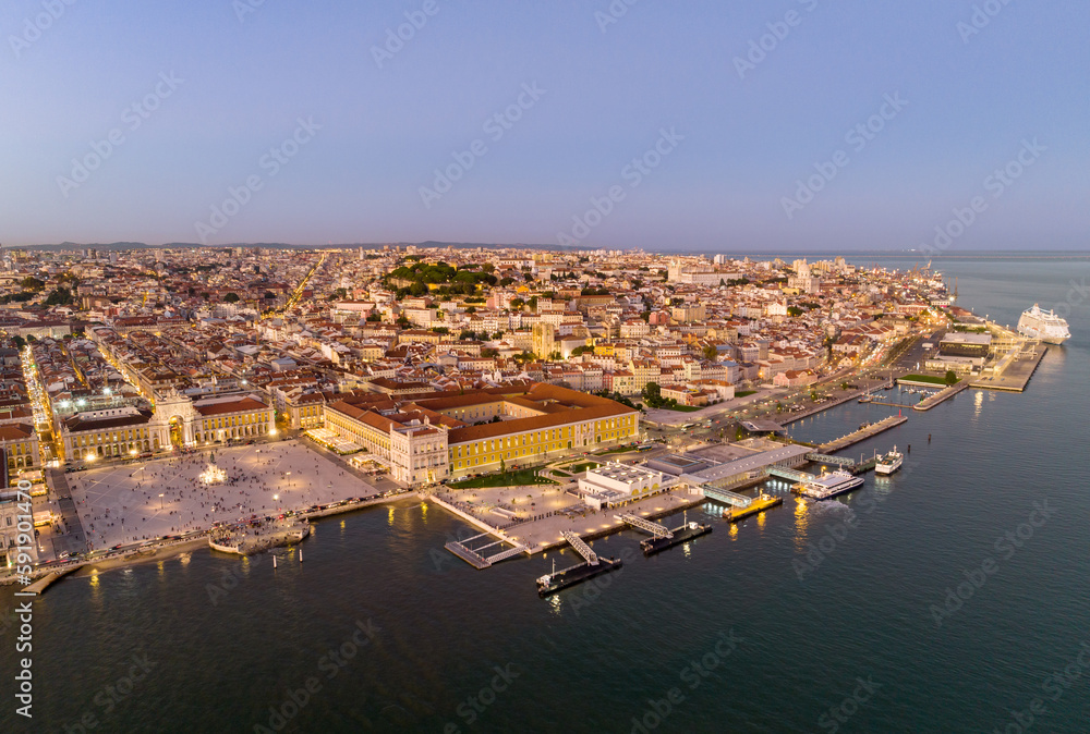 Obraz premium Commerce Square at night in Lisbon, Portugal. Palace Yard, Royal Palace of Ribeira. Drone Point of View