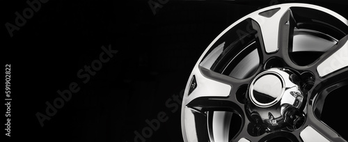 Beautiful powerful alloy wheels for SUVs close-up on a black background, copy space panoramic
