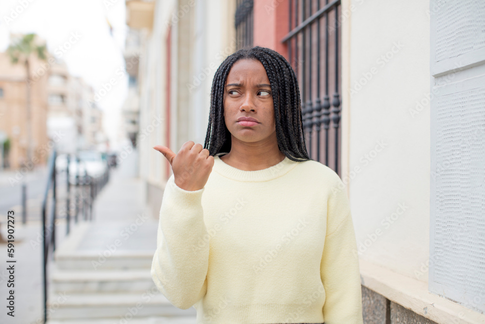 afro pretty black woman worried, feeling scared, frustrated and stressed afro pretty black woman worried, feeling scared, frustrated and stressed