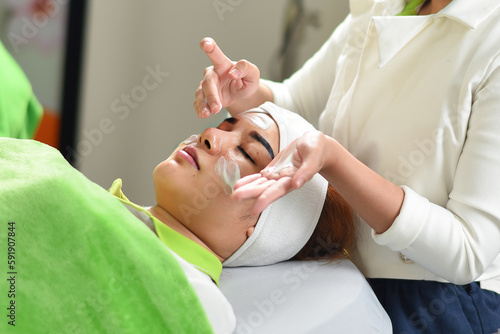The woman has a facial treatment,face massage