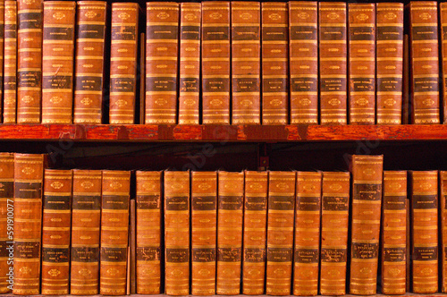 row of old books in a library